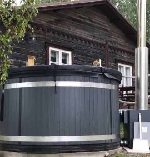 De kachel verwarmt het badwater in de hottub | Kirami